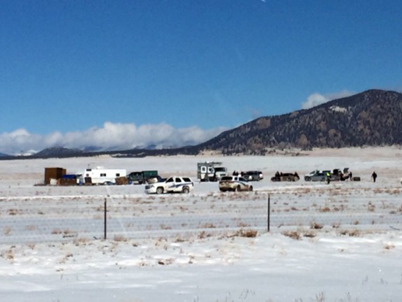 Investigators search an area where Robert Lewis Dear lived far left near the town of Hartsel Colo