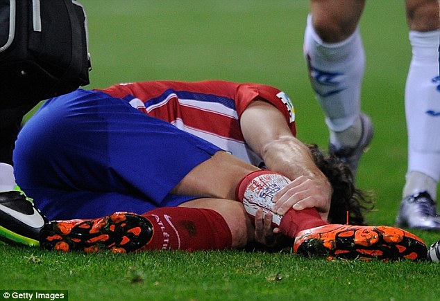 Atletico Madrid midfielder Tiago is expected to miss around four months after breaking his leg