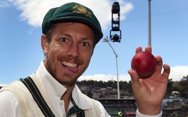 Australian paceman James Pattinson holds the ball after taking five West Indies wickets on the third day of the first cricket Test match in Hobart