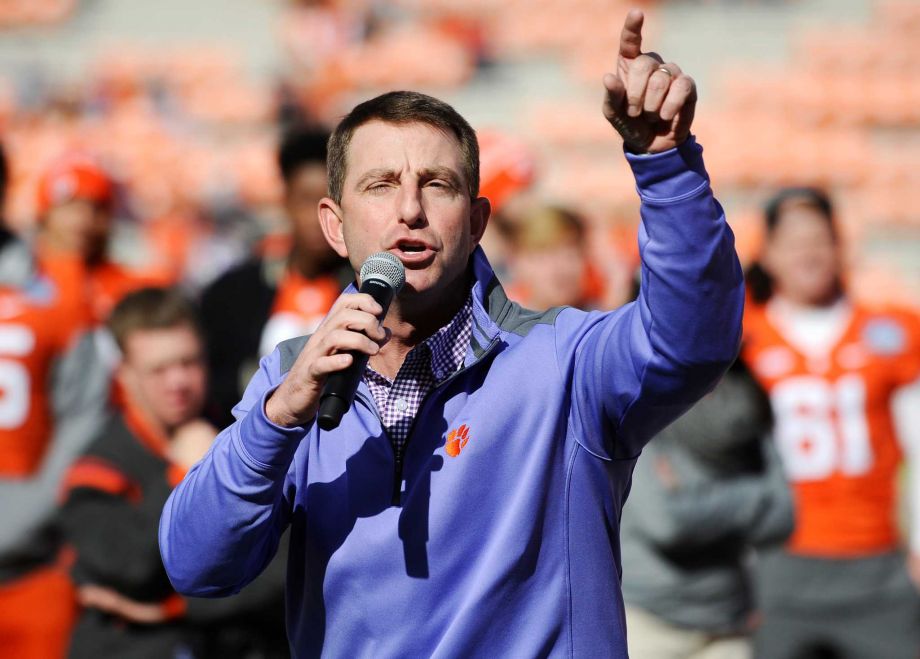 Clemson football head coach Dabo Swinney speaks to the crowd during a pizza party celebrating Selection Sunday at Memorial Stadium Sunday Dec. 6 2015 in Clemson S.C