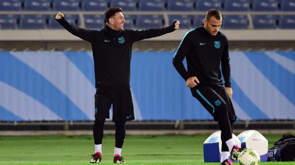 Barcelona forward Lionel Messi attends a football training session in Yokohama suburban Tokyo