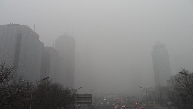 Beijing partially shut down as smog blankets city