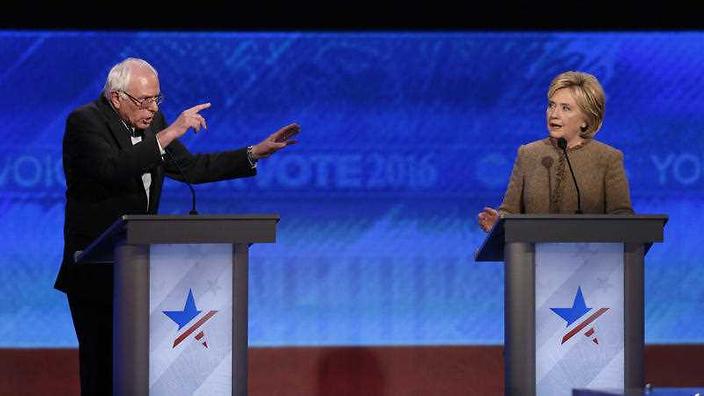 Bernie Sanders and Hillary Clinton speak during an exchange during the Democratic presidential primary debate            
    
              
     
      N