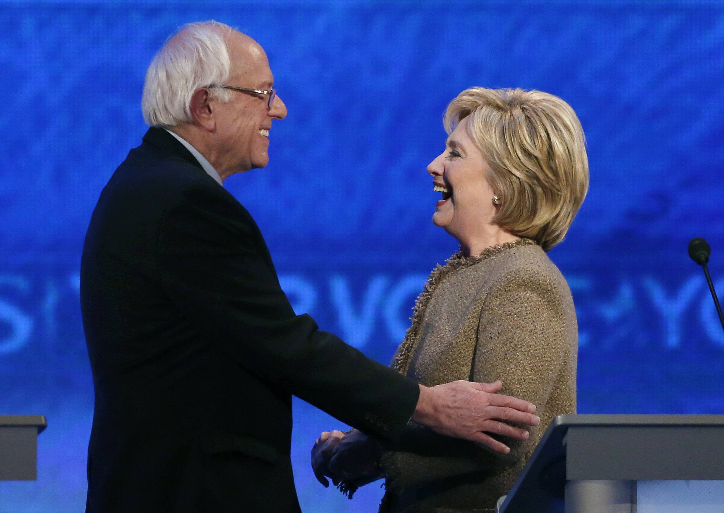 Bernie Sanders left with Hillary Clinton during a break at a Democratic presidential primary debate