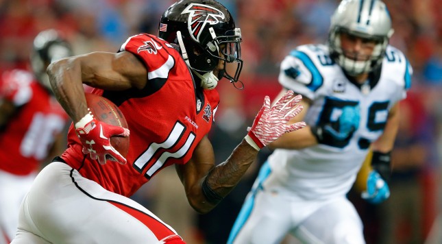 ATLANTA GA- DECEMBER 27 Julio Jones #11 of the Atlanta Falcons runs after a catch during the first half against the Carolina Panthers at the Georgia Dome