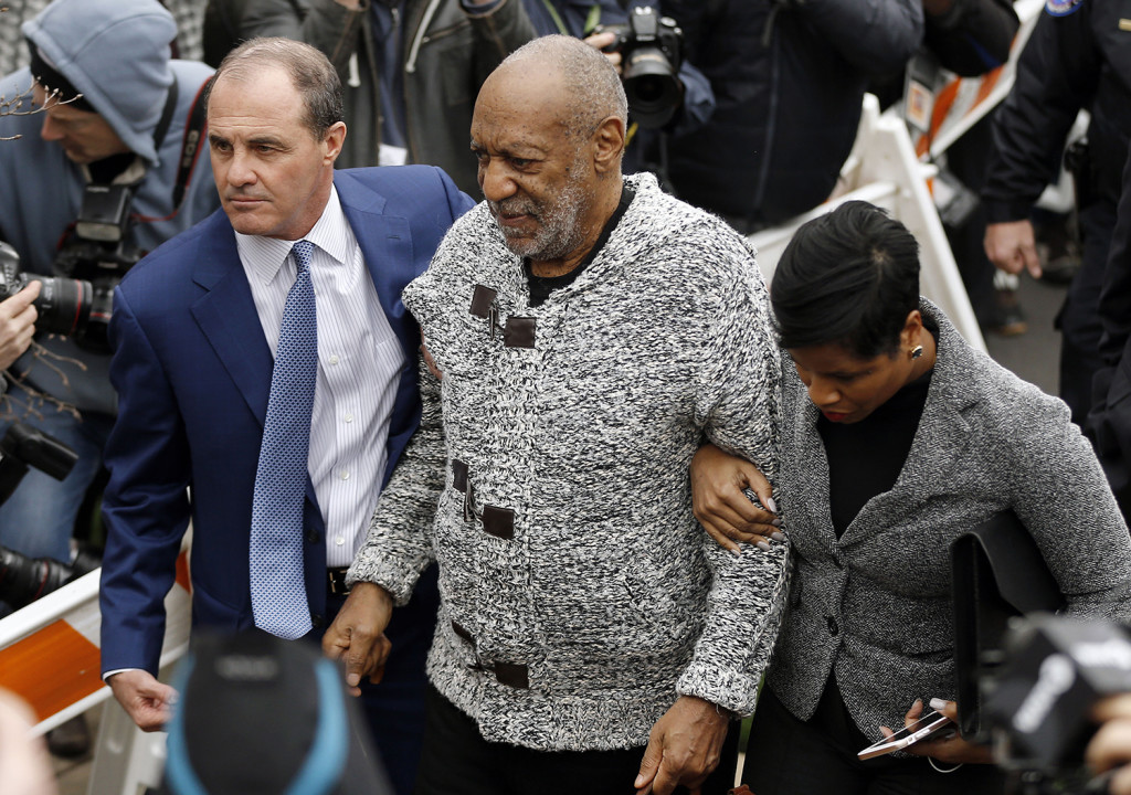 Bill Cosby arrives at court to face a felony charge of aggravated indecent assault Wednesday in Elkins Park Pa. Cosby was charged Wednesday with drugging and sexually assaulting a woman at his home 12 years ago. The Associated Press