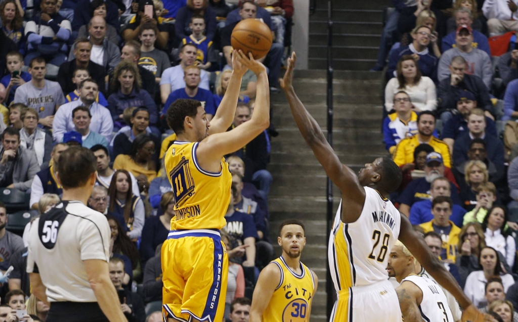 Dec 8 2015 Indianapolis IN USA Indiana Pacers forward Paul George is guarded by Golden State Warriors guard Stephen Curry at Bankers Life Fieldhouse. Golden State defeats Indiana 131-123. Mandatory Credit Brian Spurlock-USA TODAY Sports