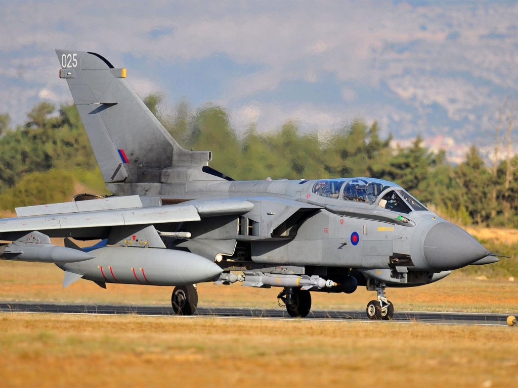 British war planes launched air strikes within hours of the Parliamentary vote PA