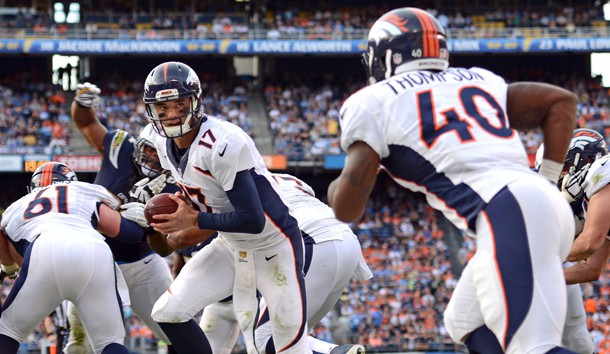 Dec 6 2015 San Diego CA USA Denver Broncos quarterback Brock Osweiler hands the ball off to running back Juwan Thompson during the fourth quarter against the San Diego Chargers at Qualcomm Stadium. Jake Roth-USA TODAY Sports