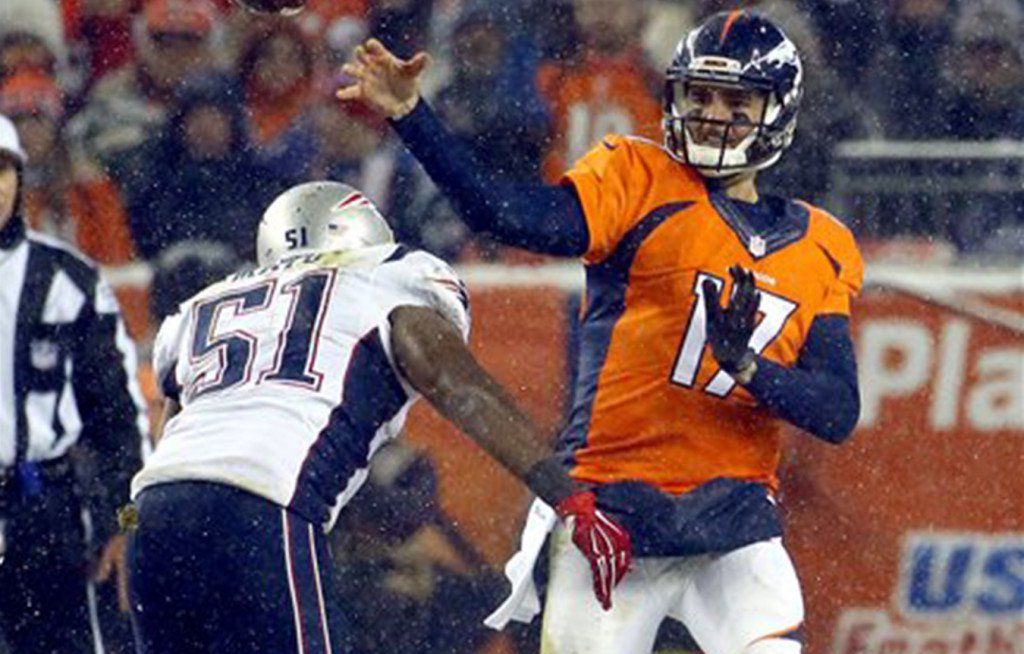 Broncos quarterback Brock Osweiler throws under pressure from Patriots middle linebacker Jerod Mayo in the second half Sunday. The Associated Press