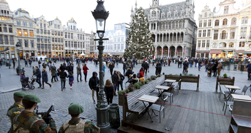 Belgian soldiers stand guard at Brussels Grand Place on Dec. 30 2015 after two people were arrested in Belgium on Sunday and Monday both suspected of plotting an attack in Brussels on New Years Eve federal prosecutors said. /Reuters