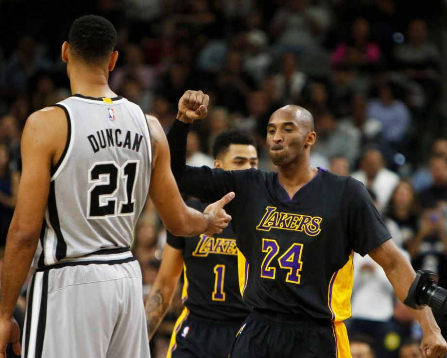 SAN ANTONIO TX- DECEMBER 11 Kobe Bryant #24 of the Los Angeles Lakers greets Tim Duncan #21 of the San Antonio Spurs before the game at AT&T Center