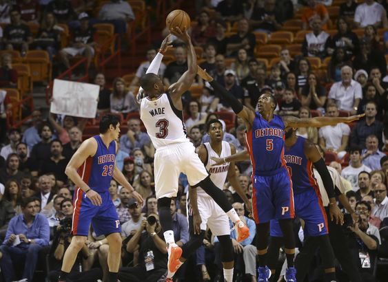 Wade shoots as Detroit Pistons Kentavious Caldwell Pope during the first half of an NBA basketball game Tuesday Dec. 22 2015 in Miami