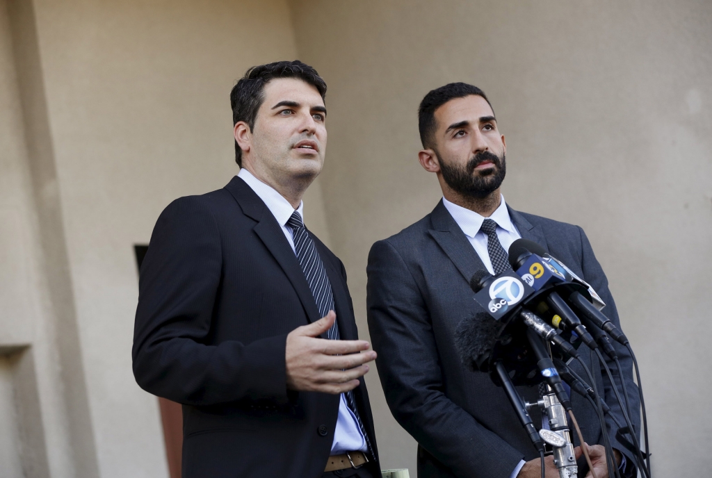 Lawyers representing the Farook family David S. Chesley and Mohammad Abuershaid, speak during a news conference in Los Angeles California