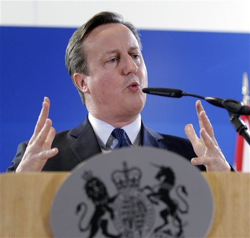 British Prime Minister David Cameron speaks during a media conference at an EU summit in Brussels on Friday Dec. 18 2015. European Union heads of state met Thursday to discuss among other issues the current migration crisis and terrorism. (AP