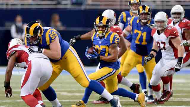 Tre Mason #27 of the St. Louis Rams carries the ball in the fourth quarter against the Arizona Cardinals at the Edward Jones Dome