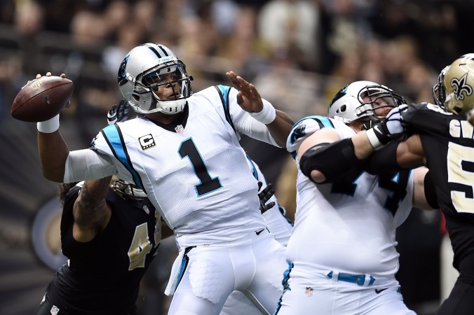 Cam Newton drops back to pass against the New Orleans Saints at the Mercedes Benz Superdome on Dec. 6 in New Orleans. The Carolina quarterback took a big step toward NFL MVP honors with his performance