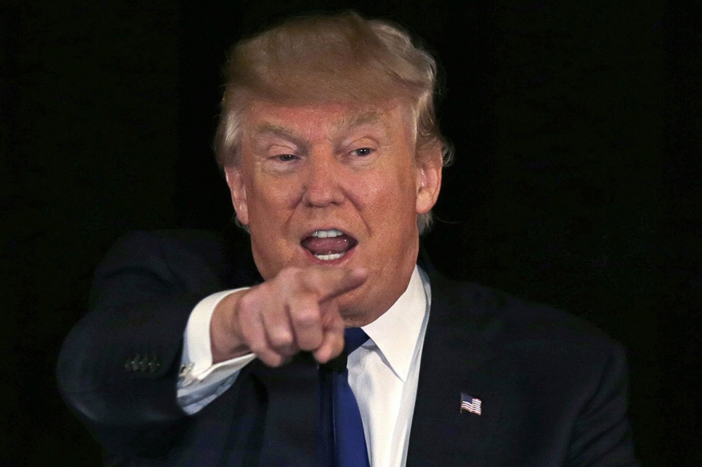 Republican presidential candidate businessman Donald Trump gestures during an address at a regional police union meeting in Portsmouth N.H. T