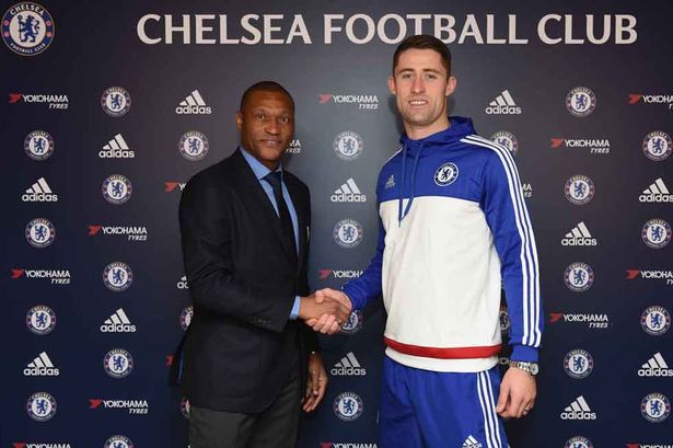 Gary Cahill with Michael Emenalo after the announcement of Cahill's new contract at the Cobham Training Ground