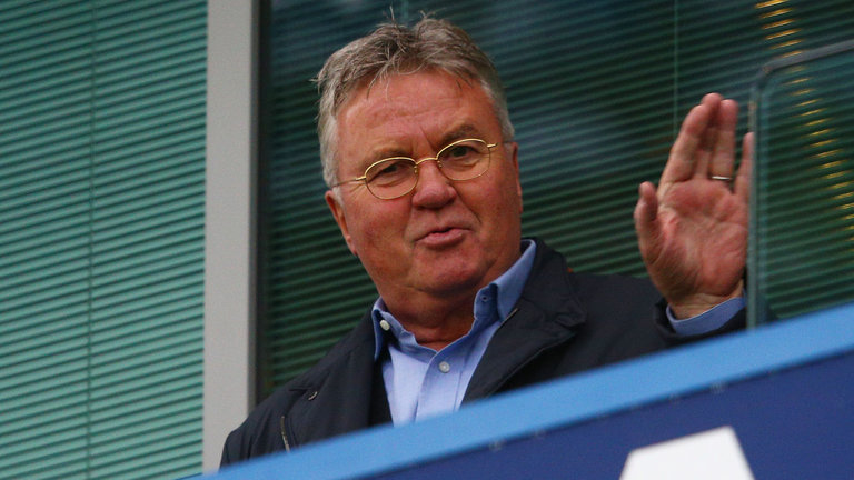 Chelsea interim manager Guus Hiddink waves to supporters