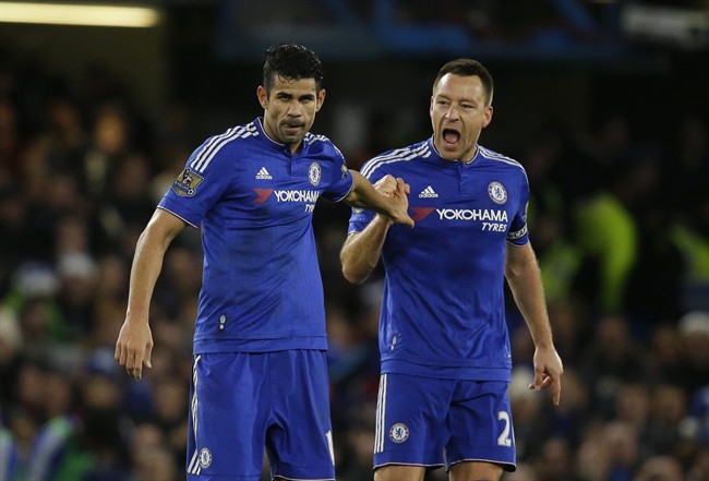 Chelsea's Diego Costa left celebrates scoring his side's second goal with captain John Terry during the English Premier League soccer match between Chelsea and Watford at Stamford Bridge stadium in London Saturday Dec. 26 2015