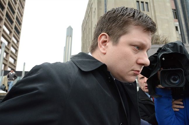 Chicago Police Officer Jason Van Dyke leaves the Criminal Courts Building Tuesday Dec. 29 2015 in Chicago. Van Dyke pleaded not guilty to murder charges in the 2014 shooting of 17-year-old Laquan Mc Donald during his arraignment. Van Dyke who is no lon