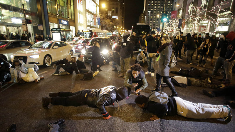 Laquan Mc Donald protesters march on Michigan Avenue on Black Friday