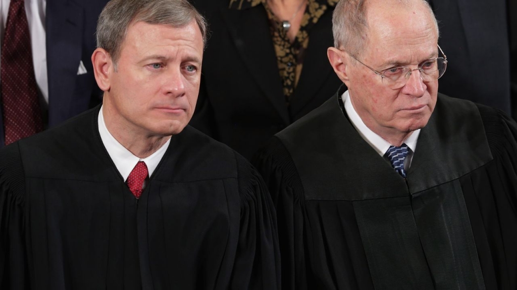 Chief Justice John Roberts with Associate Justice Anthony Kennedy in 2014.     Chip Somodevilla  Getty Images