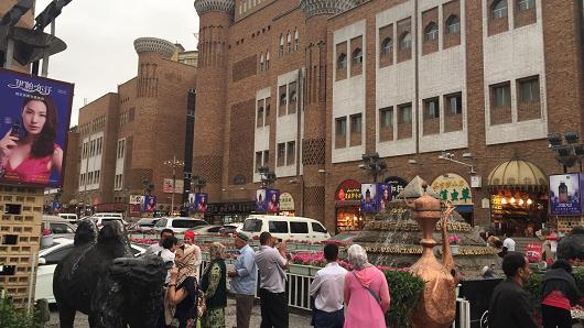 People in the streets of the Uighur city of Kashgar in northwestern Xinjiang during July's Ramadan