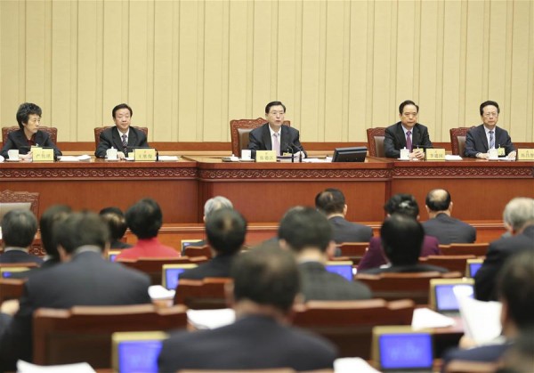 Zhang Dejiang, chairman of the Standing Committee of China's National People's Congress, presides over the closing meeting of the 18th bimonthly meeting of the National People's Congress Standing Committee in Beijing capital of China