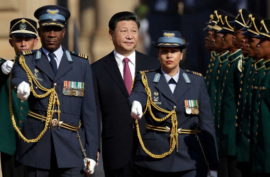 Chinese President Xi Jinping reviewsan honor guard during a welcome ceremony at Union Building Pretoria South Africa Wednesday Dec. 2 2015