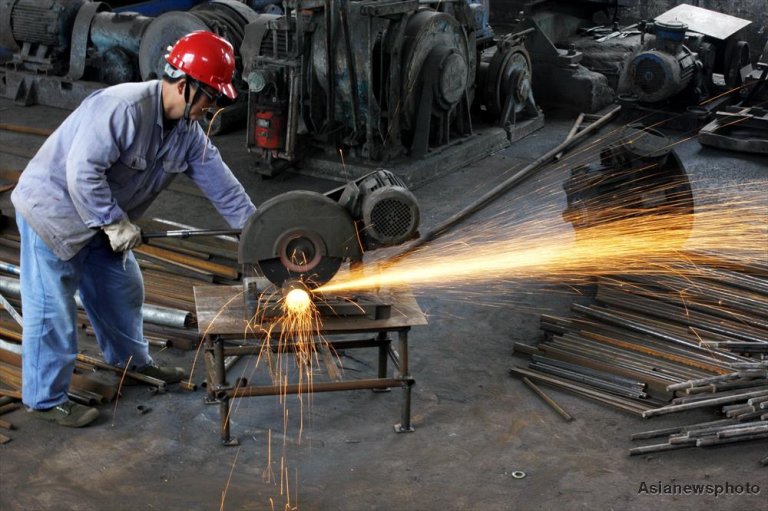 A worker works at a factory in Huaibei Anhui province