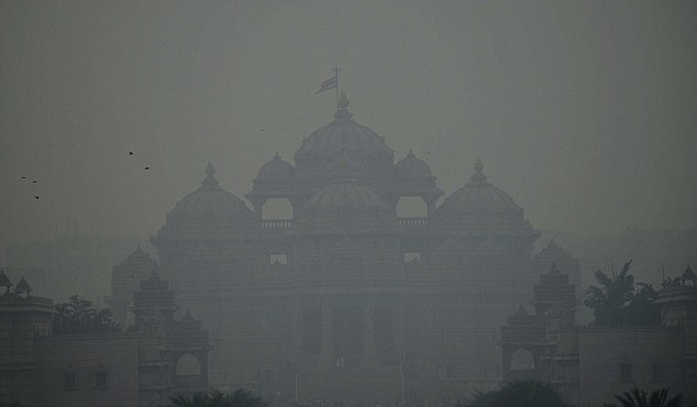 Choking smog hangs over the Akshardham Temple on December 23