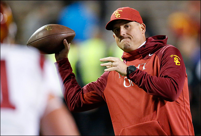 USC names Helton permanent coach after Trojans beat UCLA