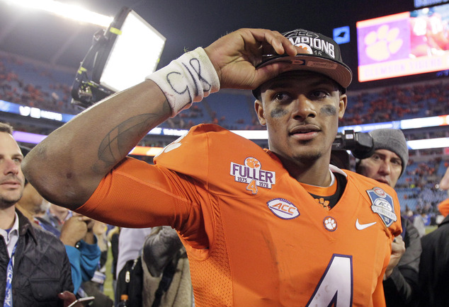 Clemson quarterback Deshaun Watson celebrates after Clemson defeated North Carolina 45-37 in the Atlantic Coast Conference championship NCAA college football