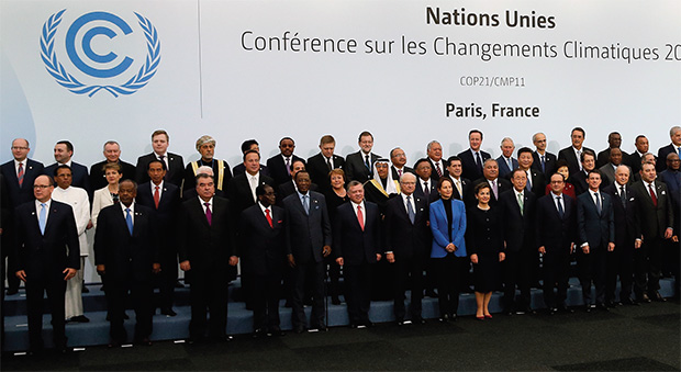 Too warm for comfort? World leaders from both developed and developing countries pose for a group