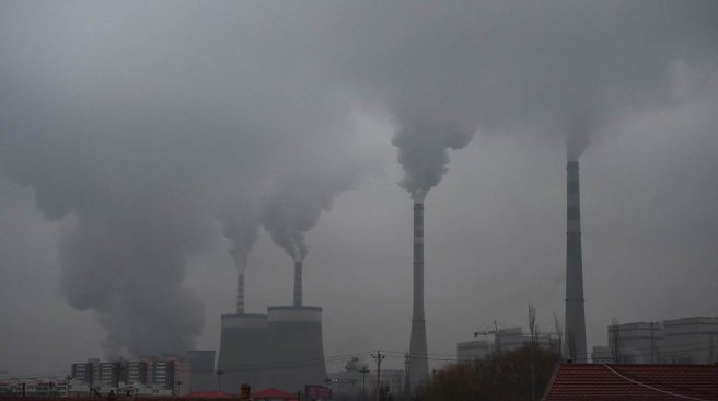 19 2015 smoke belches from a coal-fired power station near Datong in China's northern Shanxi province. AFP