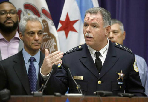 Chicago Police Superintendent Garry McCarthy right speaks about first-degree murder charges against police officer Jason Van Dyke in the death of 17-year-old Laquan McDonald as Mayor Rahm Emanuel looks on at left on Nov. 24. (Charles Rex Arbogast Asso