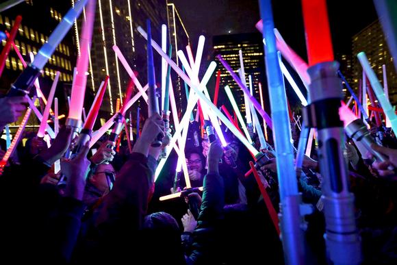 Close												People gather with their lightsabers during a Star Wars themed lightsaber battle at Sue Bierman Park in San Francisco Dec. 18