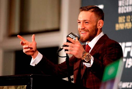 Conor Mc Gregor speaks at a post-fight press conference after beating Jose Aldo in their featherweight title fight during UFC 194 at MGM Grand Garden Arena