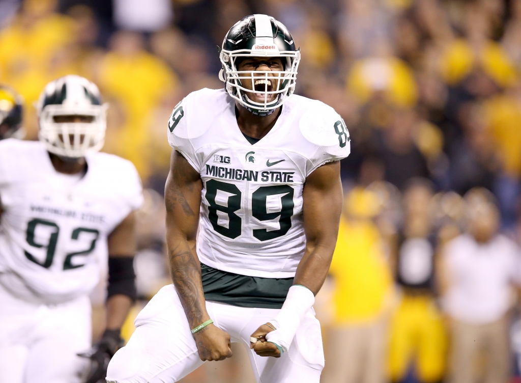 Shilique Calhoun #89 of the Michigan State Spartans celebreates after making a play against the Iowa Hawkeyes in the Big Ten Championship at Lucas Oil Stadium