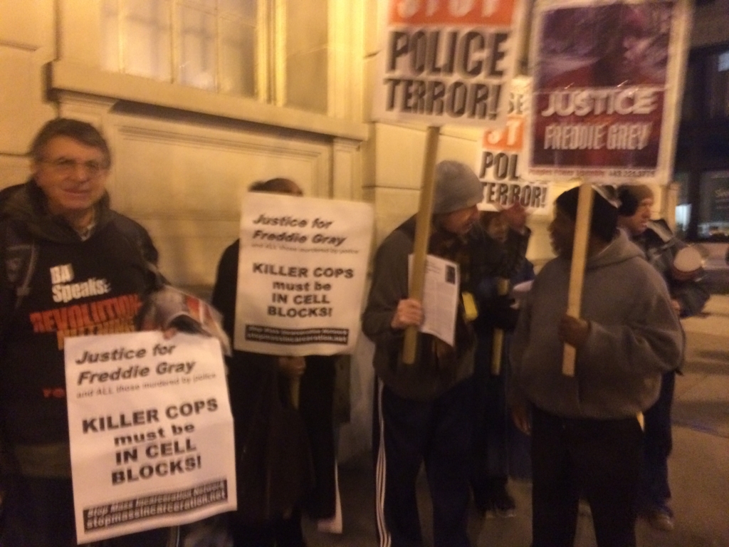 About a dozen protesters staged a demonstration last night outside of the courthouse