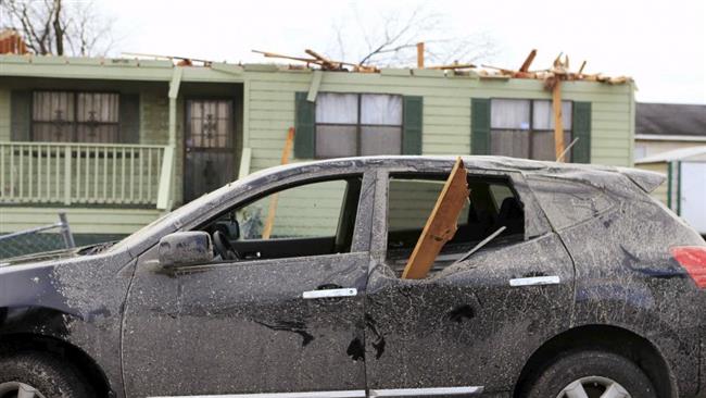 Damage caused by a tornado is seen in a neighborhood in Birmingham Alabama