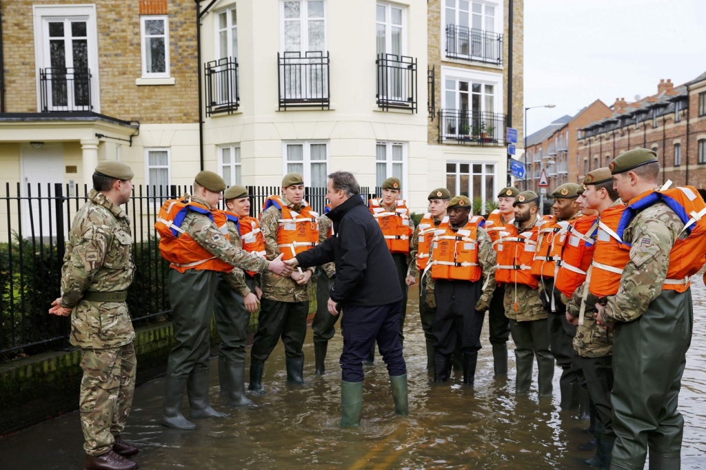 British PM visits flood zone in northern England