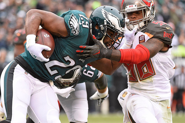 Philadelphia Eagles running back De Marco Murray is tackled by Tampa Bay Buccaneers middle linebacker Kwon Alexander during the first quarter at Lincoln Financial Field. The Buccaneers defeated the Eagles 45-17