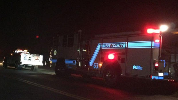 Firetrucks and ambulances en route to debris field that may be medical helicopter crash site in Bakersfield California on night