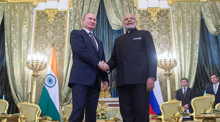 Russian President Vladimir Putin left and Indian Prime Minister Narendra Modi meet in the Kremlin