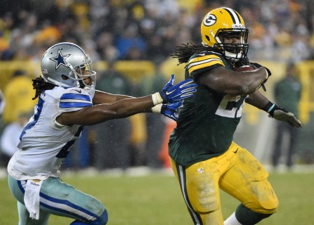 Dec 13 2015 Green Bay WI USA Green Bay Packers running back Eddie Lacy runs past Dallas Cowboys safety J.J. Wilcox for a first down in the fourth quarter at Lambeau Field. Mandatory Credit Benny Sieu-USA TODAY Sports