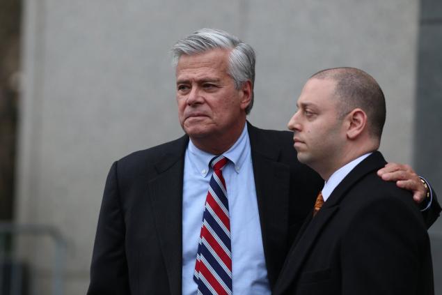 Dean and Adam Skelos leave court on Friday in New York. They were found guilty on all charges in their corruption trial