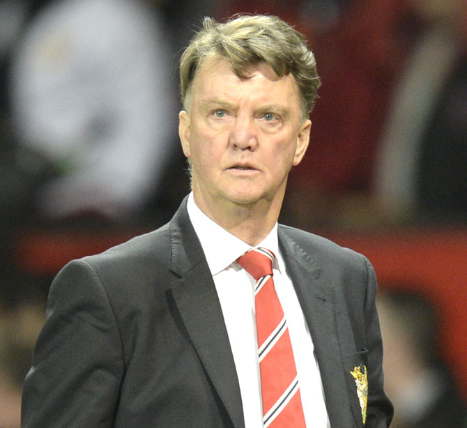 Manchester United's Dutch manager Louis van Gaal leaves the pitch after the final whistle of the English Premier League football match between Manchester United and Chelsea at Old Trafford in Manchester. Pic  AFP